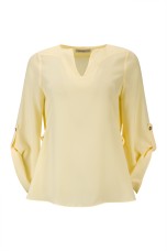 Blouse with gold eyelets