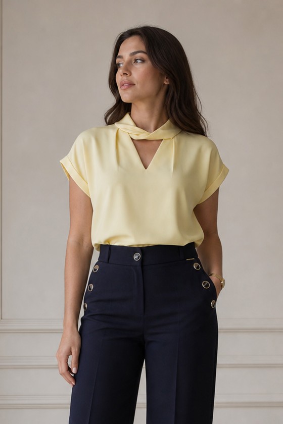 Blouse with a twisted collar