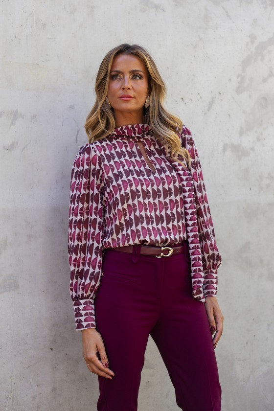 Tunic with a bow