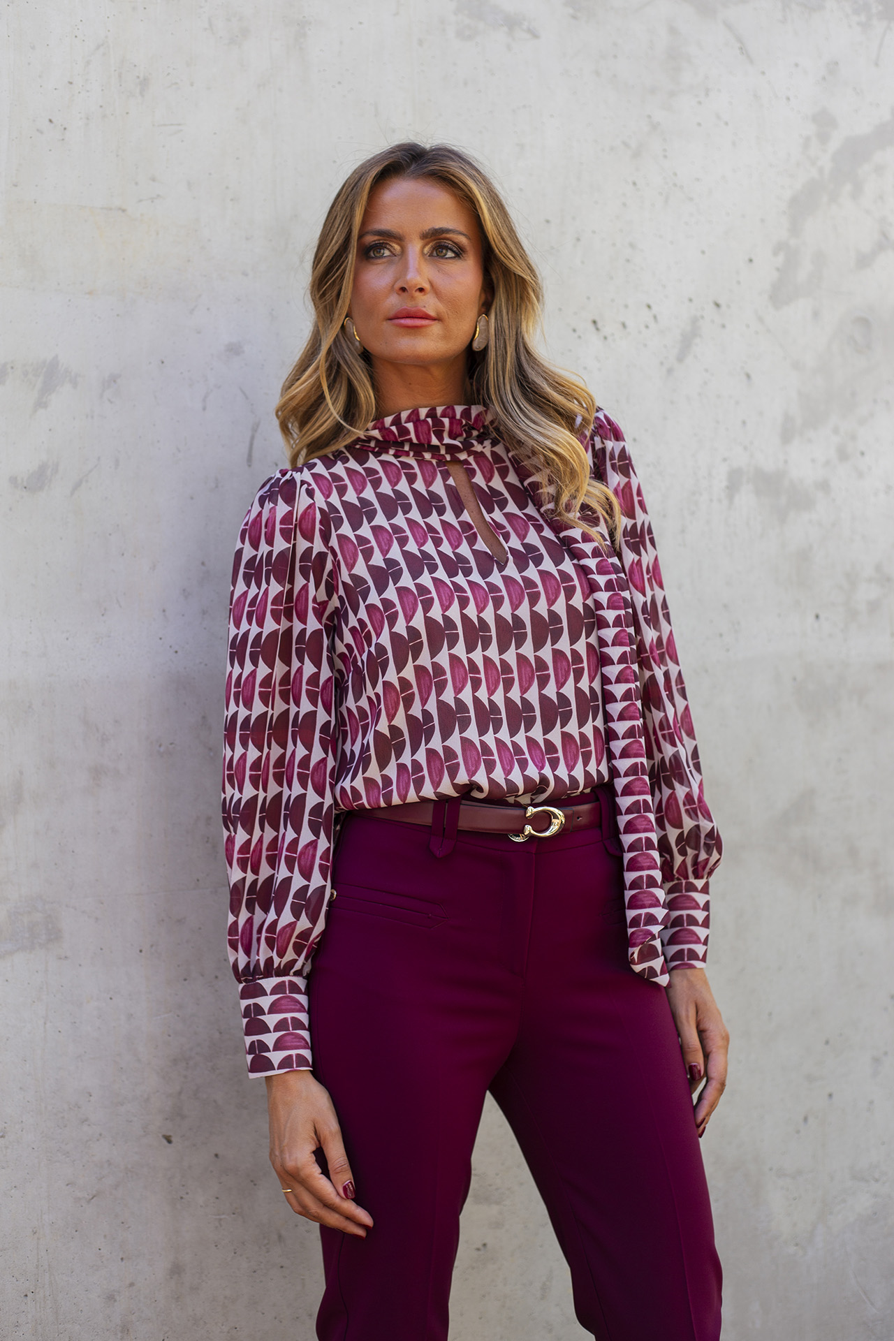Tunic with a bow