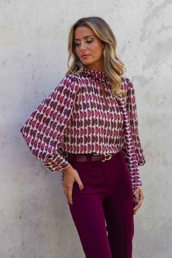 Tunic with a bow