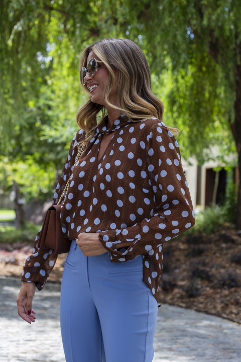 Polka dot tunic with twisted collar