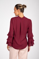 Tunic with ruffled sleeves