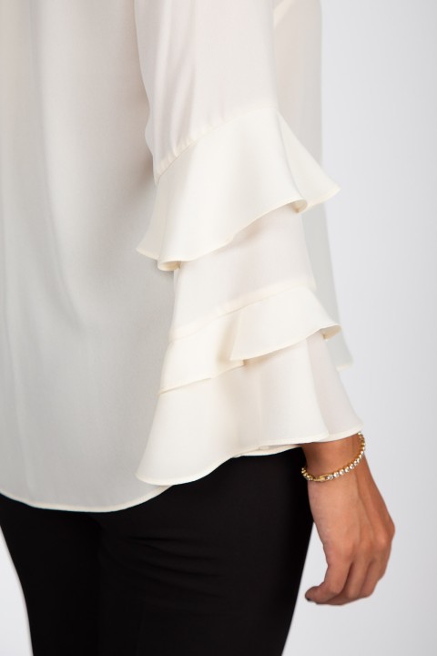 Tunic with ruffled sleeves