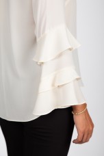 Tunic with ruffled sleeves