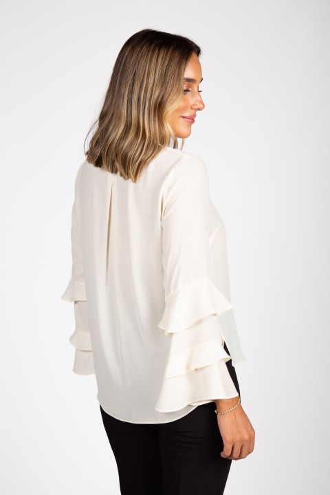 Tunic with ruffled sleeves