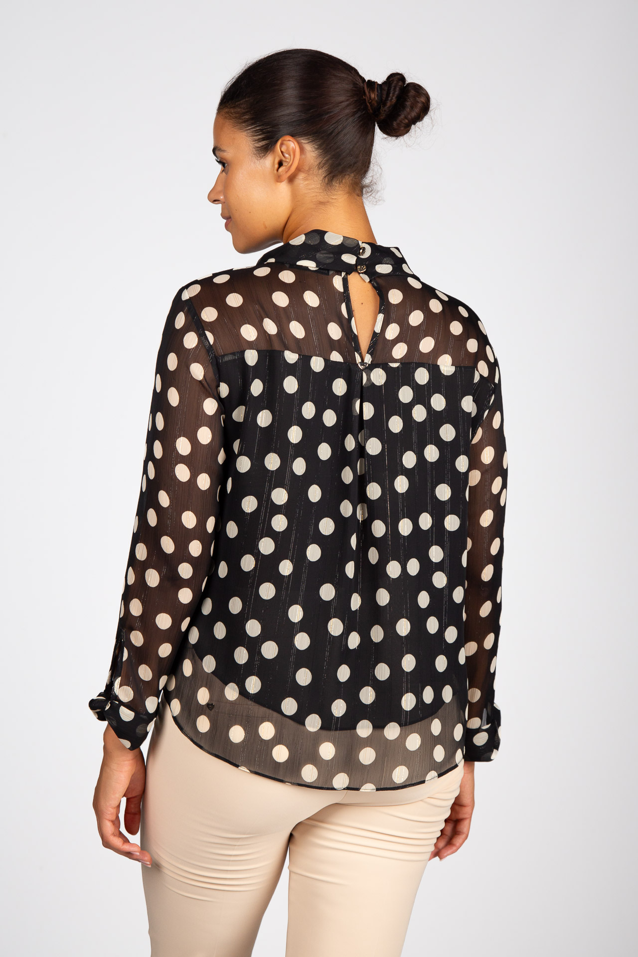 Polka dot tunic with twisted collar