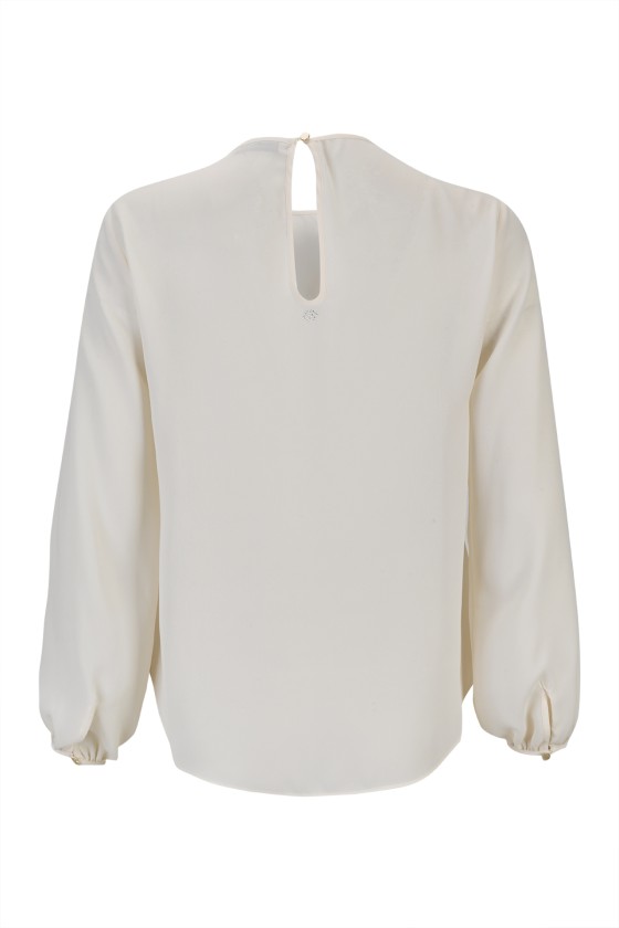 Cascading ruffled tunic