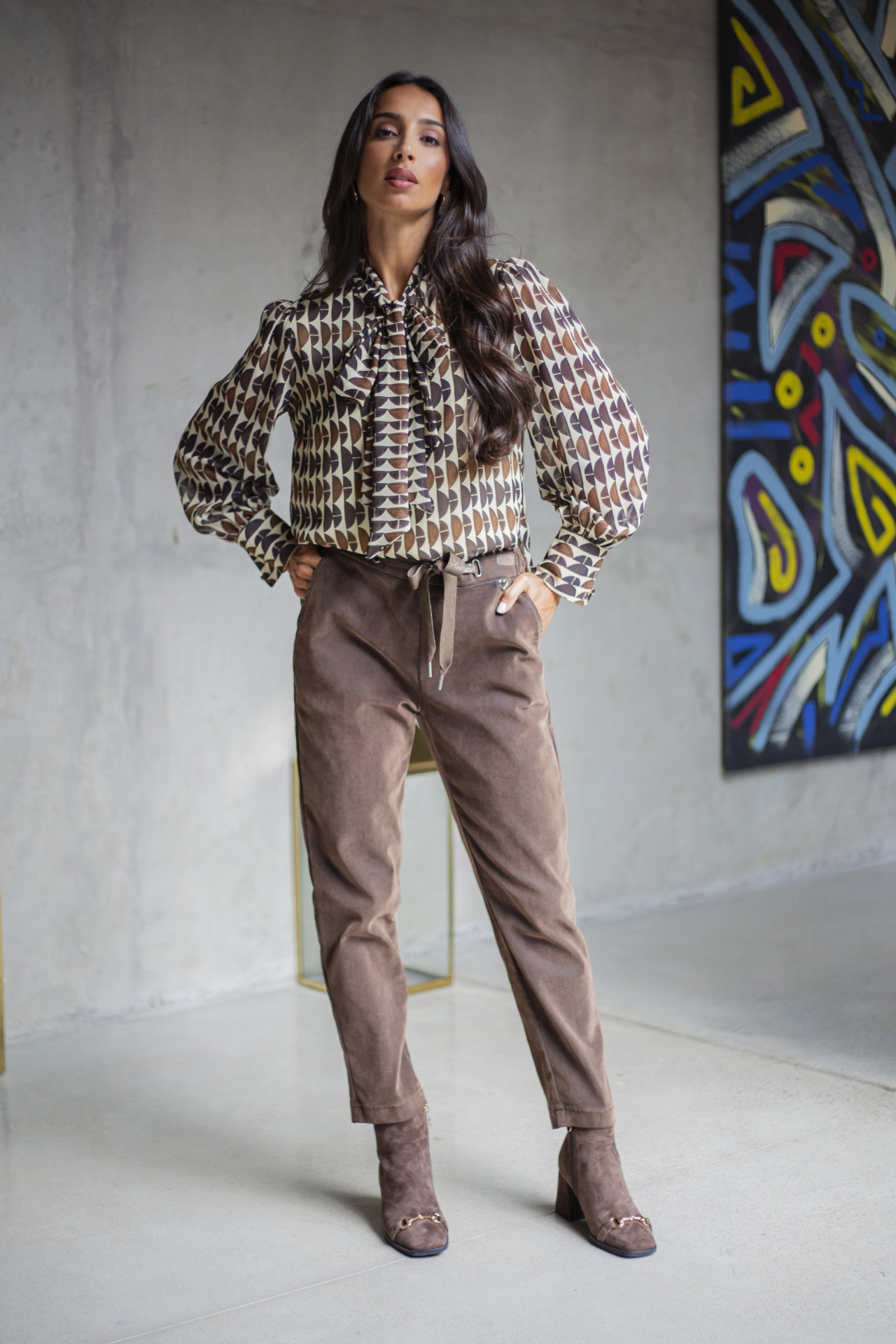 Tunic with a bow
