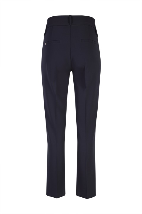 Trousers with pockets and flaps