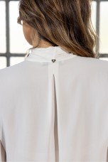 Tunic with a bow