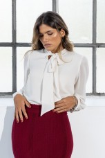 Tunic with a bow