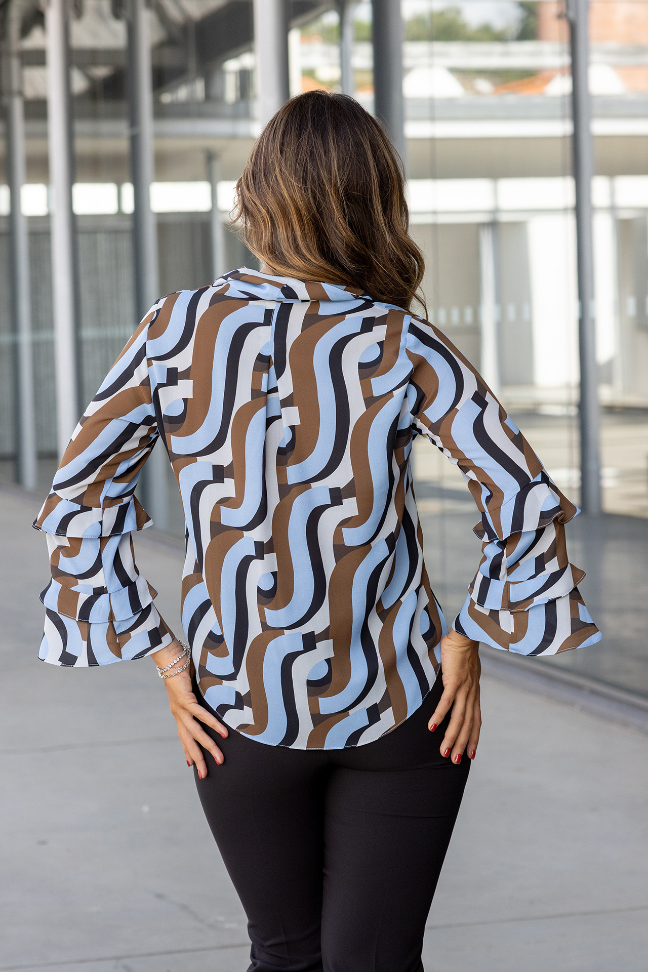 Printed tunic with ruffled sleeves