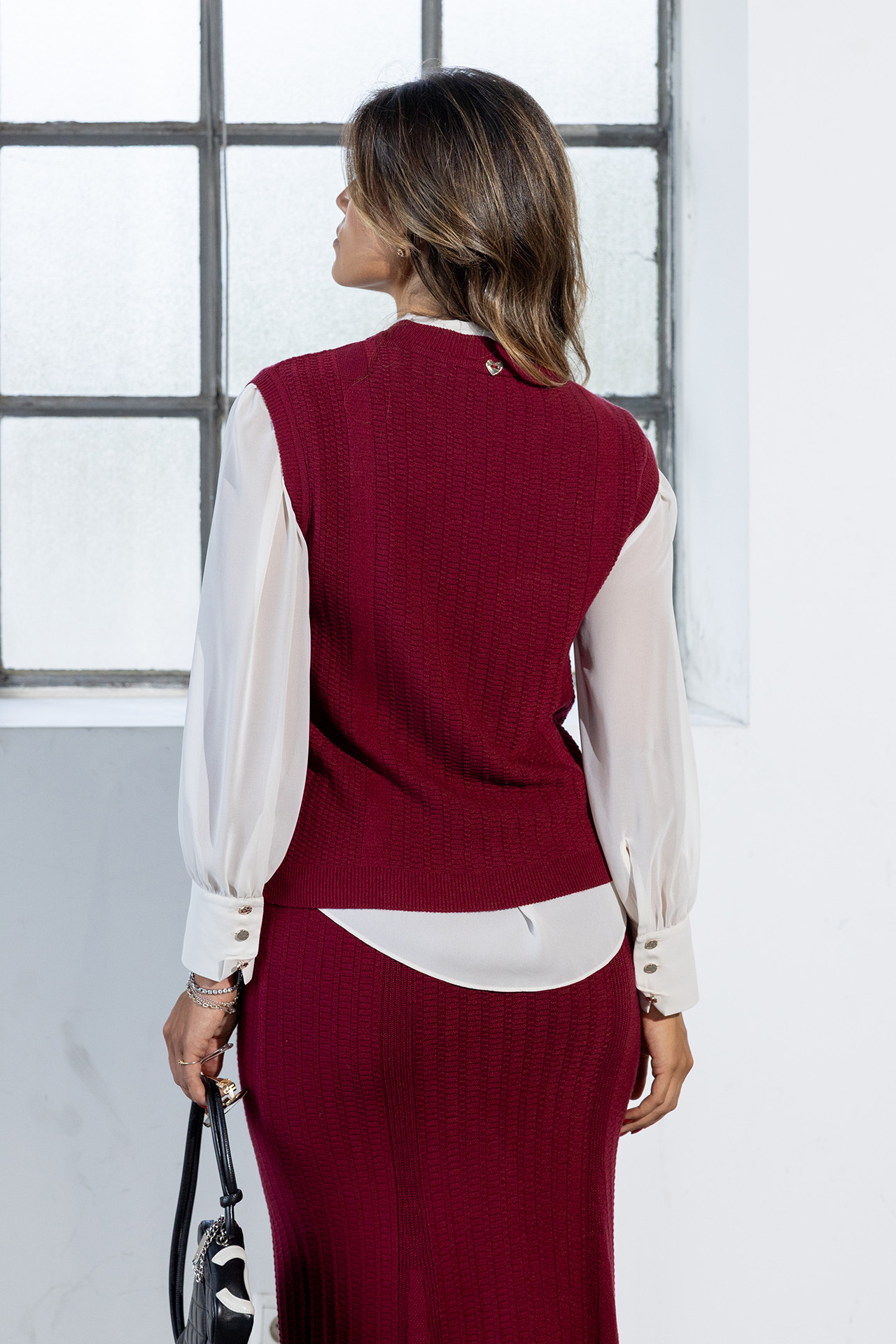 Jacquard knit vest with metal buttons