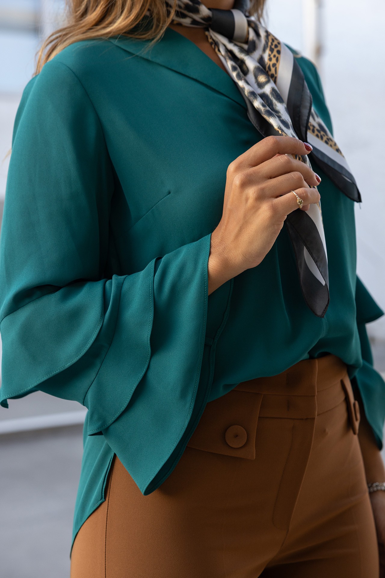 Tunic with ruffled sleeves