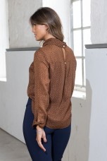 Polka dot tunic with twisted collar