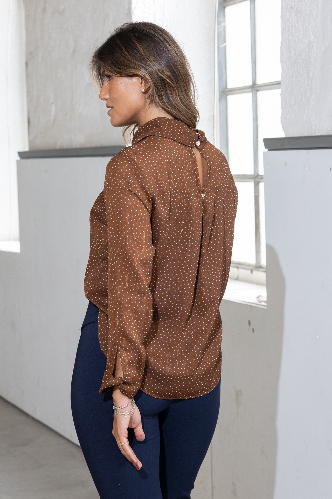 Polka dot tunic with twisted collar