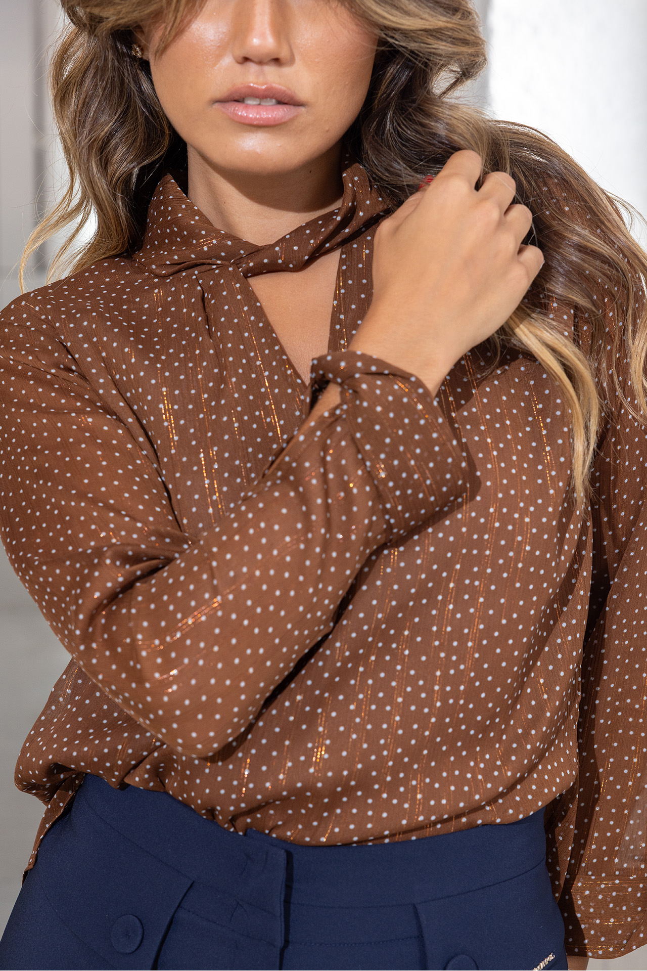Polka dot tunic with twisted collar