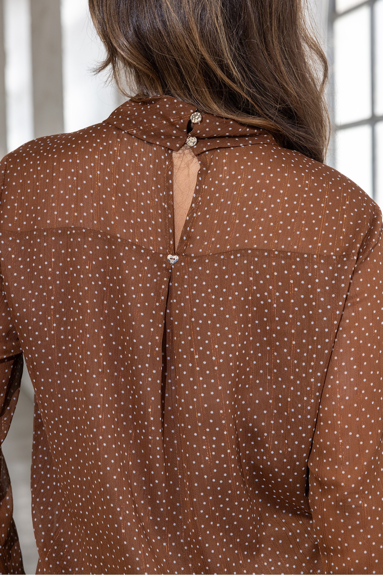 Polka dot tunic with twisted collar