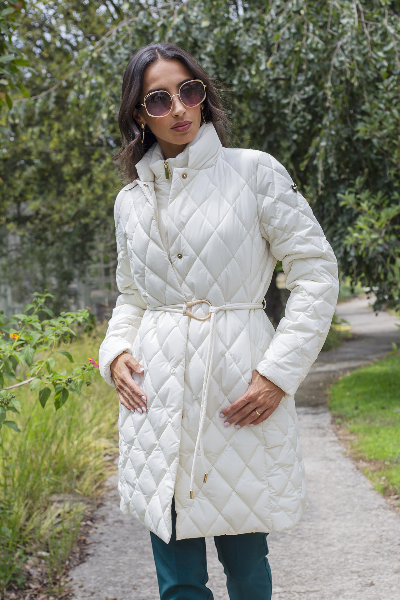 Quilted parka with metal buckle belt