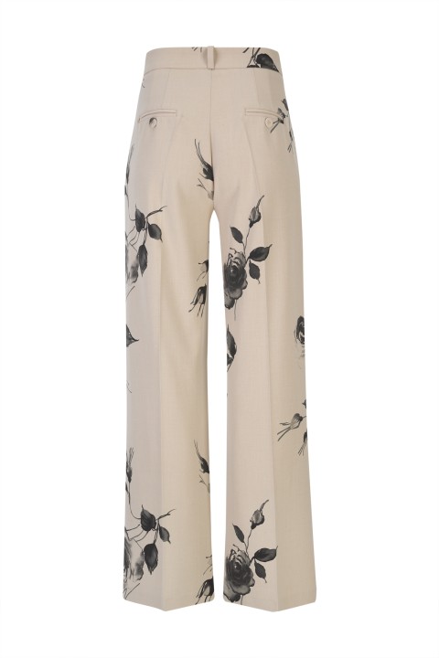 Calças pantalonas estampado floral Calças pantalonas estampado floral