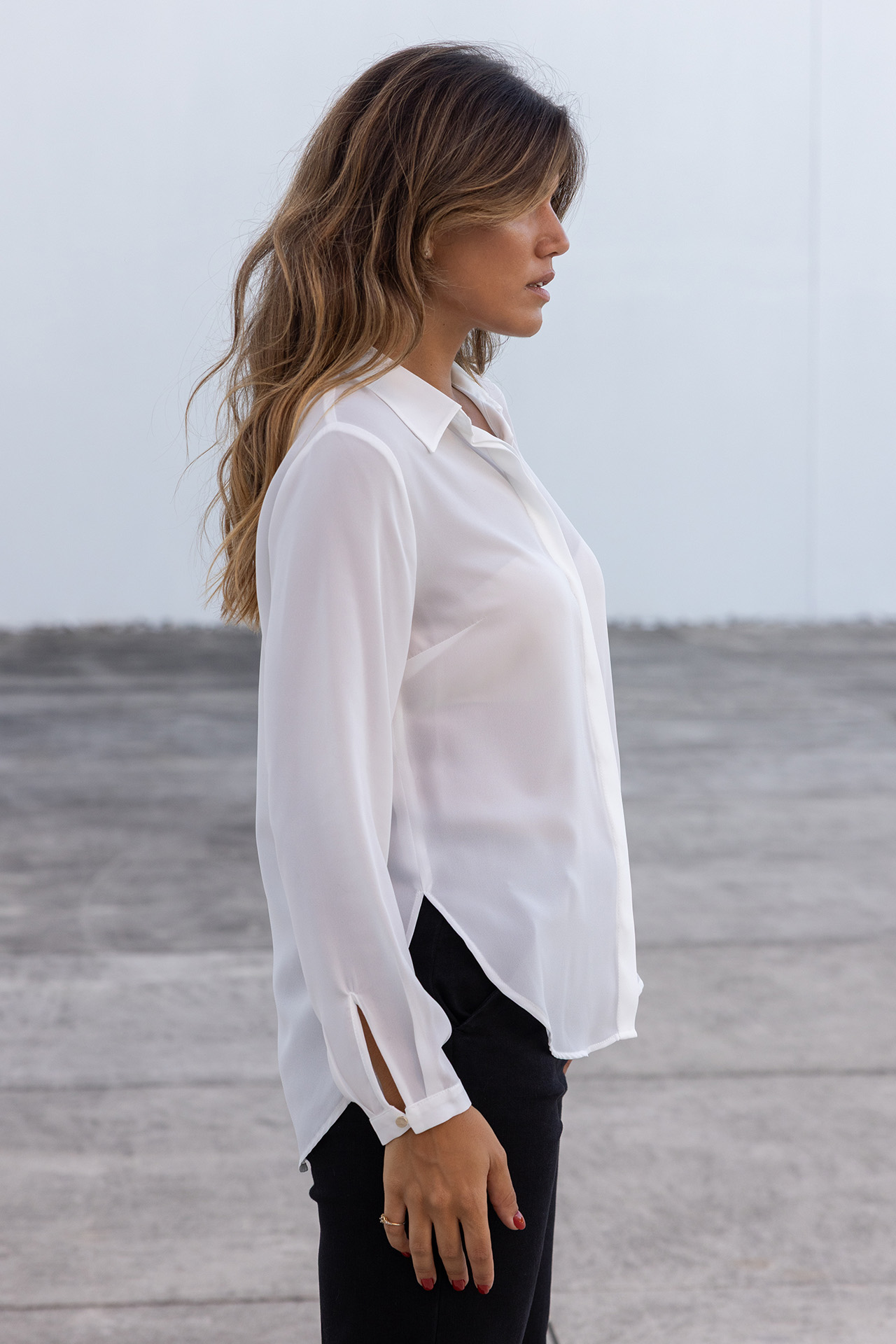 Cream blouse with a classic cut