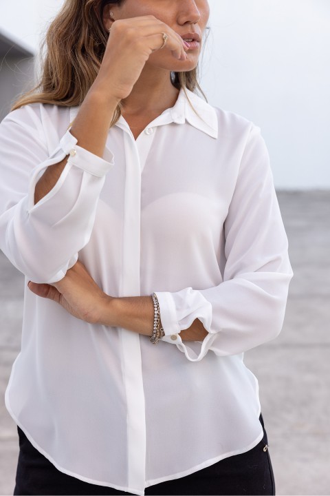 Cream blouse with a classic cut