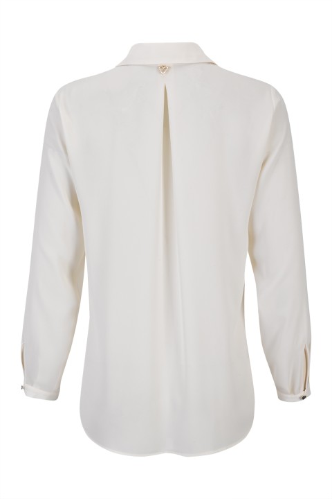 Cream blouse with a classic cut