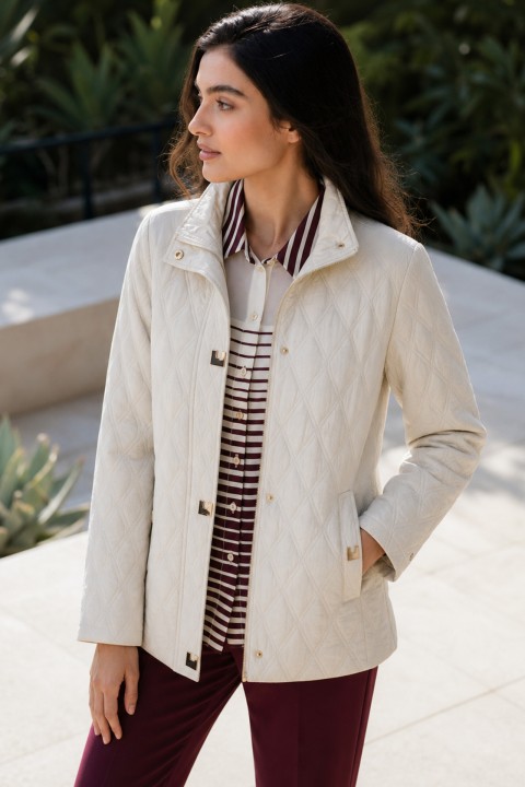 Lightweight quilted parka with snap fastenings