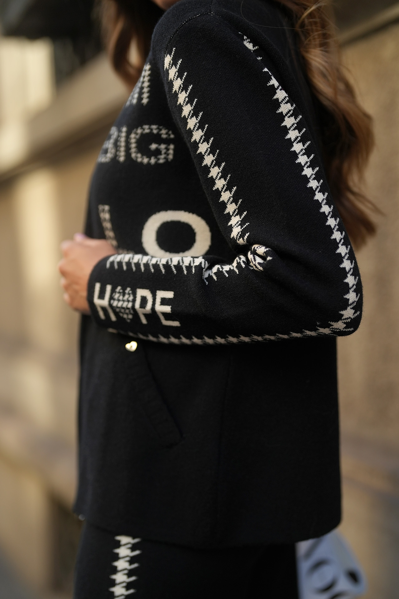 Knitted jacket with jacquard lettering