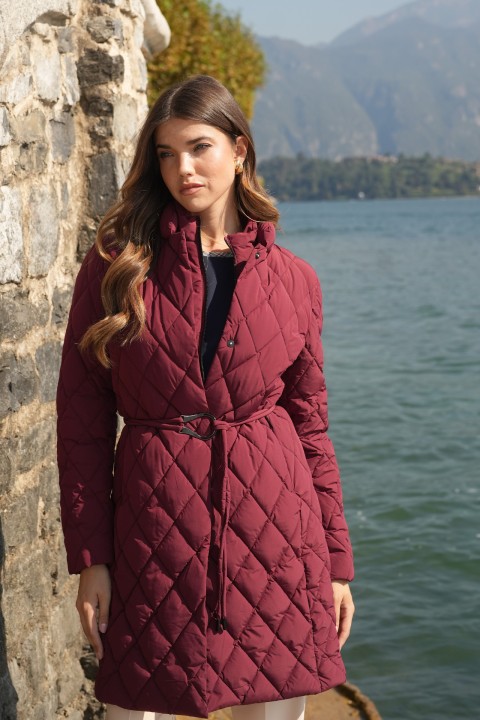 Quilted parka with metal buckle belt