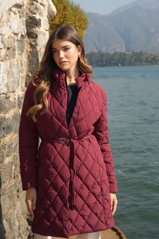 Quilted parka with metal buckle belt